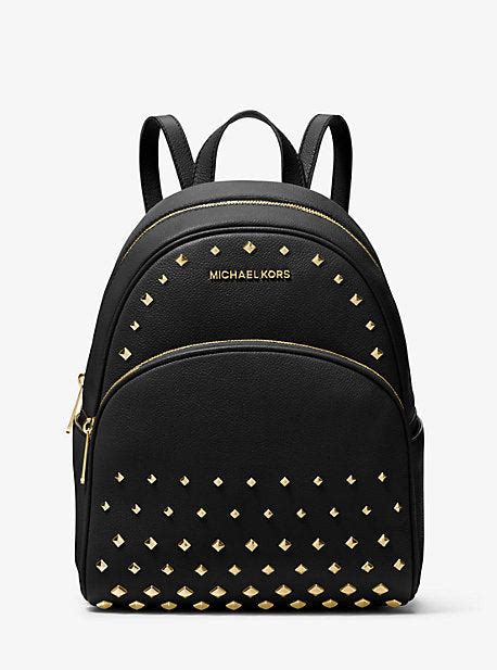 michael kors abbey medium gold studded backpack|Abbey Medium Studded Pebbled Leather Backpack .